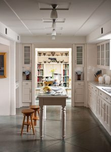 White Kitchen with Concrete Floor